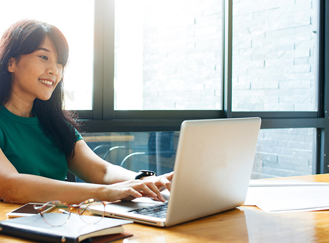 A student uses a laptop during a virtual career fair.